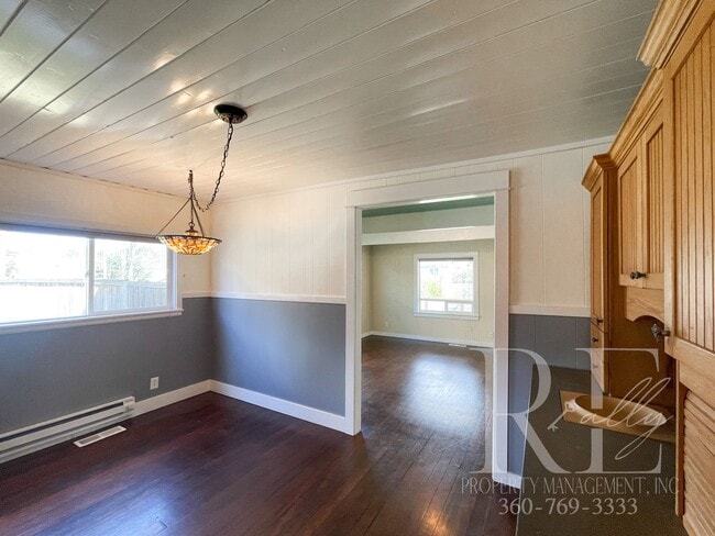Building Photo - Whimsical Craftsman with Wraparound Porch, Bonus Room & Liberty Bay Peek Views