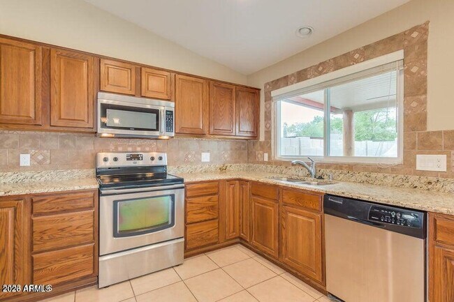 Building Photo - 6808 E Sandra Terrace