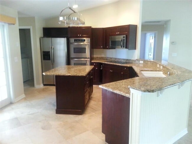 Building Photo - 9149 Palm Tree Dr