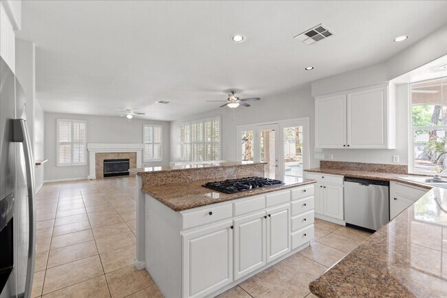 Building Photo - Expansive 4 Bedroom Home with a Pool and L...