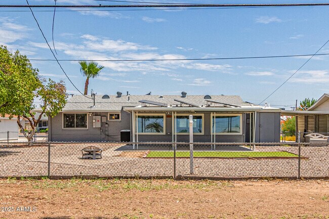 Building Photo - 12640 N Pebble Beach Dr