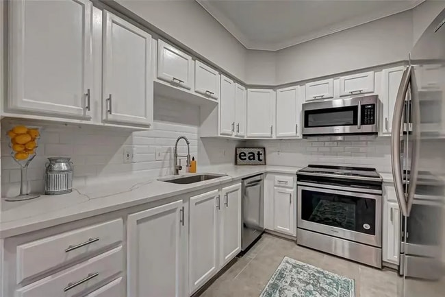 Building Photo - Experience comfort and elegance - 2BD/2.5B...