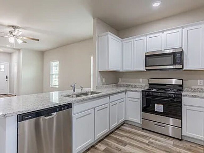 Building Photo - **Discover Elevated Living at Hunters Ranch!**