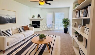 Building Photo - Creekwood Park Townhomes — Reduced rent + claim your choice of a brand-new 55" TV or a $250 Amazo...