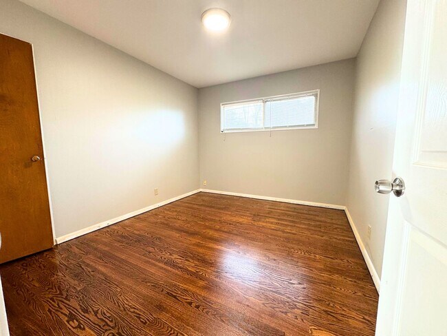 Building Photo - Charming Mid-Century Home with Basement and Fenced Backyard!