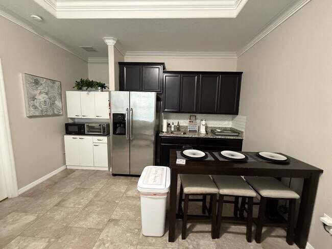 Building Photo - Furnished 1-Bedroom Apartment in Kindred –...