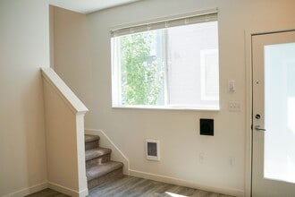 Building Photo - Modern & Sleek One-Bedroom Townhouse Ready...