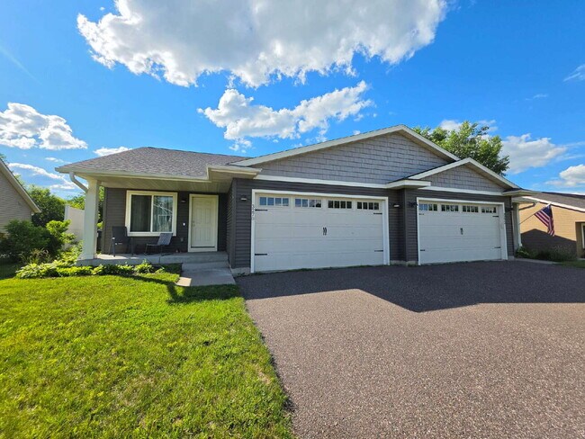 Building Photo - Spacious 4-Bedroom Home with Vaulted Ceilings, Finished Lower Level & 2-Car Garage