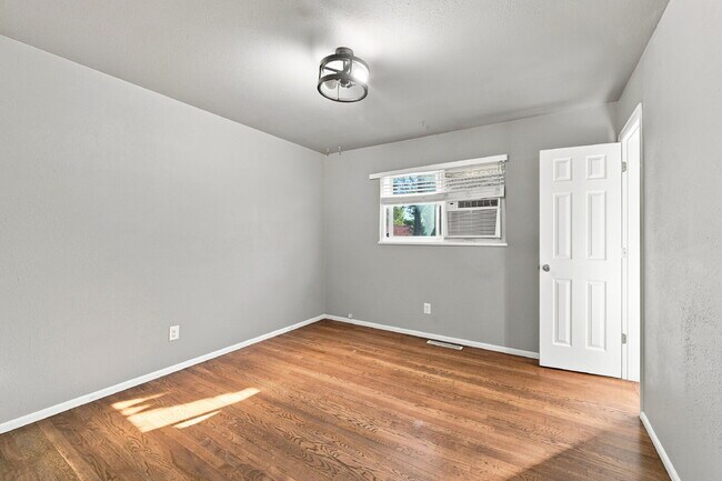 Building Photo - $2,195.95, 5-bed, 2.5-bathroom located in Colorado Springs with a fenced backyard.