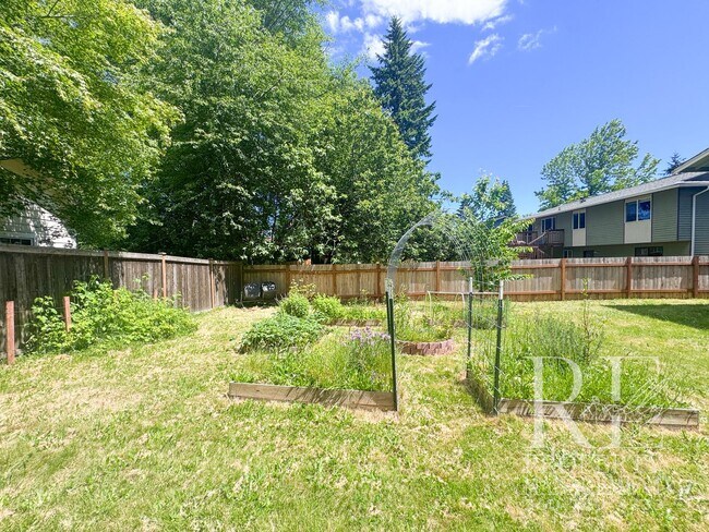 Building Photo - Spacious Poulsbo Home with Large Basement, Fenced Yard & Garden Space