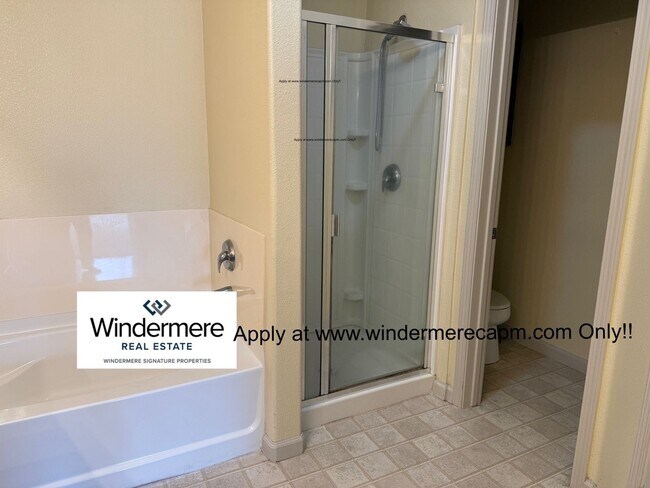 Building Photo - Absolute MUST See Condo In Immaculate Condition With Open Flowing Floor Plan!