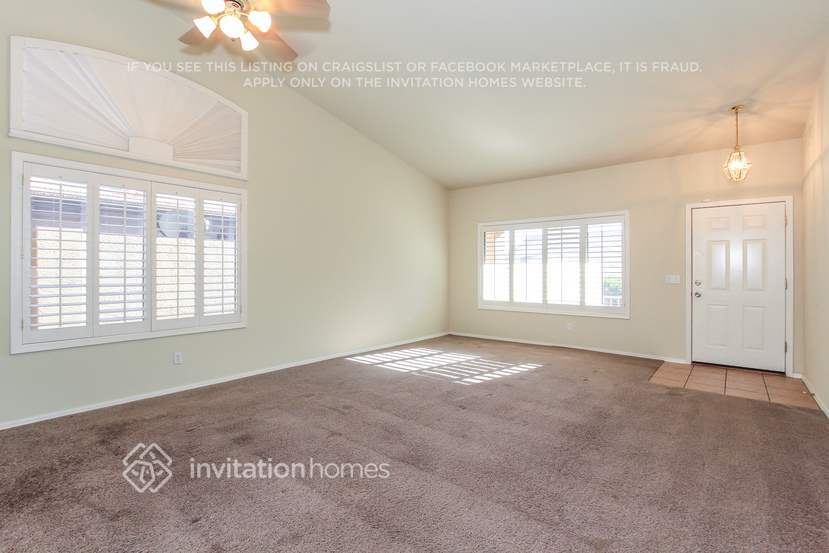 Building Photo - 8228 W Harmony Ln