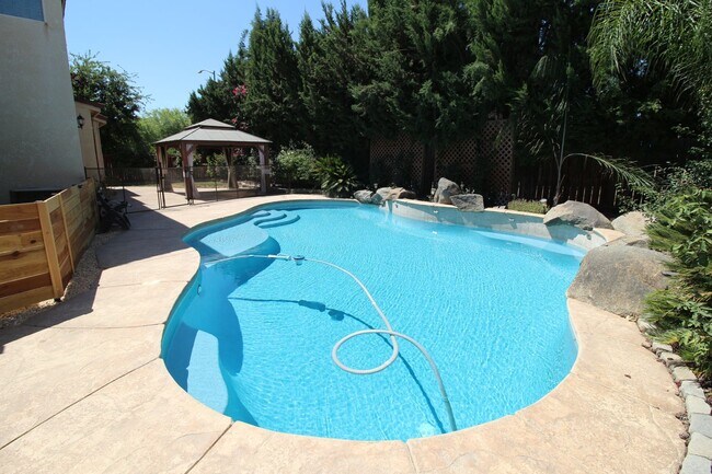 Building Photo - Cute Two-Story Home With Pool & RV Parking