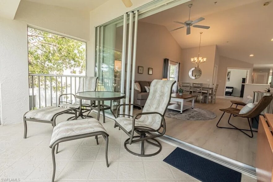 View from Lanai to Family Room; Sliders Open - 5090 Cedar Springs Dr