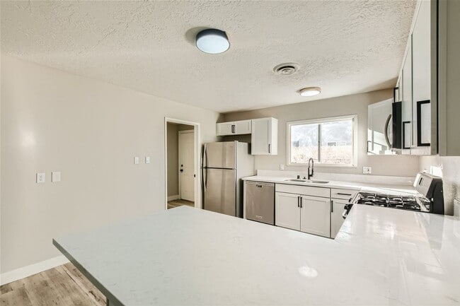 Building Photo - STUNNINGLY REMODELED Single Story Home wit...