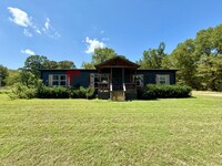 Building Photo - Tour Today! Spacious 4-Bedroom Home with Large Metal Building & Outdoor Kitchen