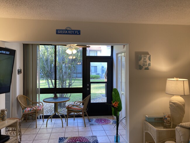 Enjoy breakfast in this open lanai - 1642 Stickney Point Rd