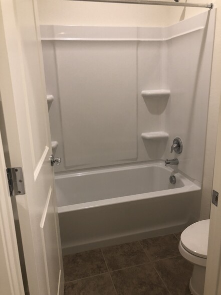 Hall bathroom - tub/shower. - 23615 W watkins st