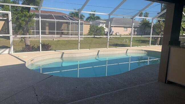 Building Photo - Dive Into Comfort – Home with Pool , Speci...