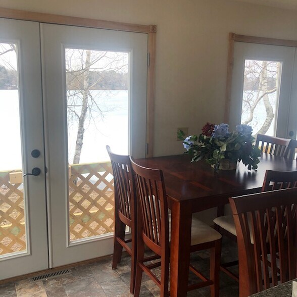 Dining area with view of the lake. - 100 Monroe Ave