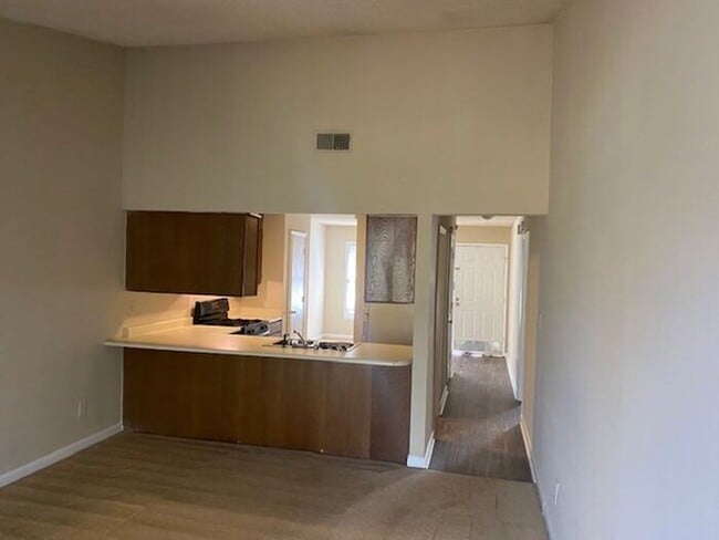 Building Photo - NOW AVAILABLE! Charming 2-Bedroom, 2-Bathroom Single-Level Townhome