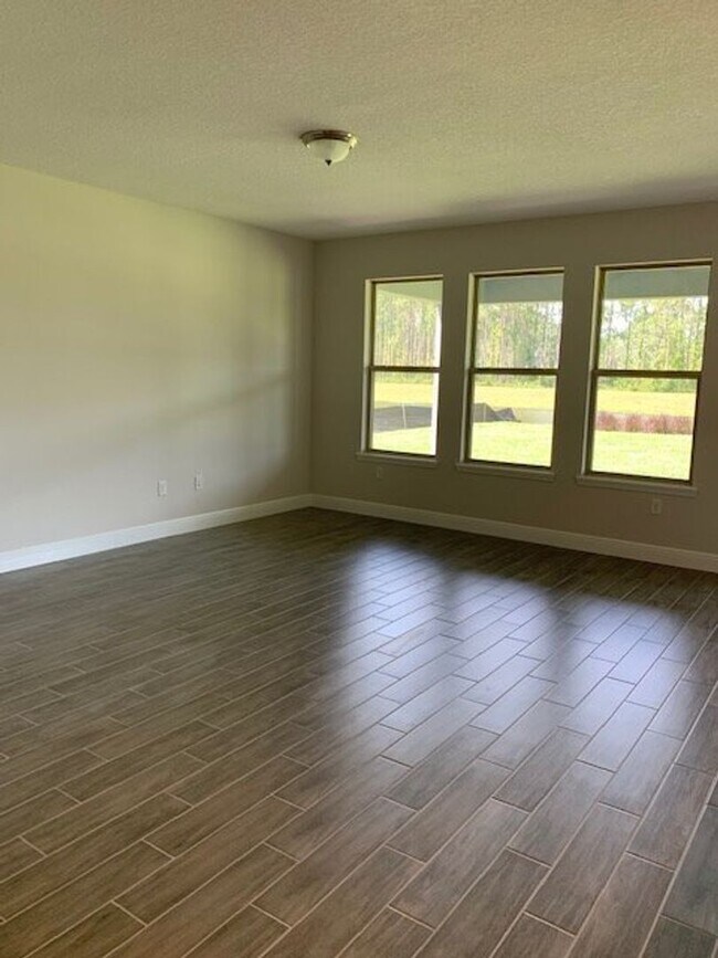 Building Photo - SPECTACULAR MODERN HOME!!Relaxing water views- MOVE IN September 2026-2 story 4 bed 3.5 bath HM i...