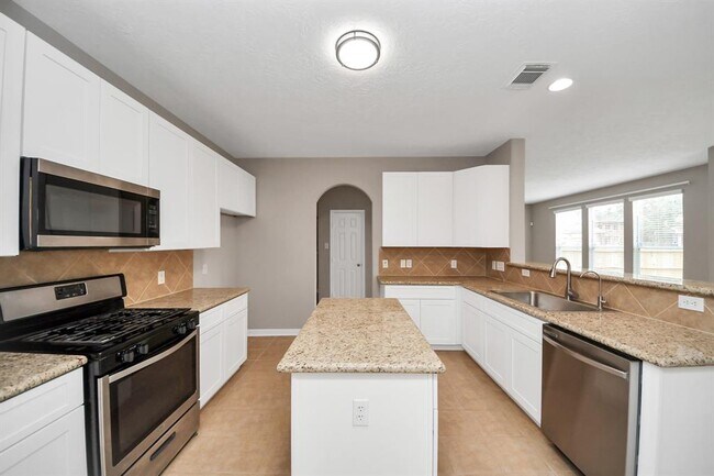 Building Photo - 7447 Oakwood Canyon Dr
