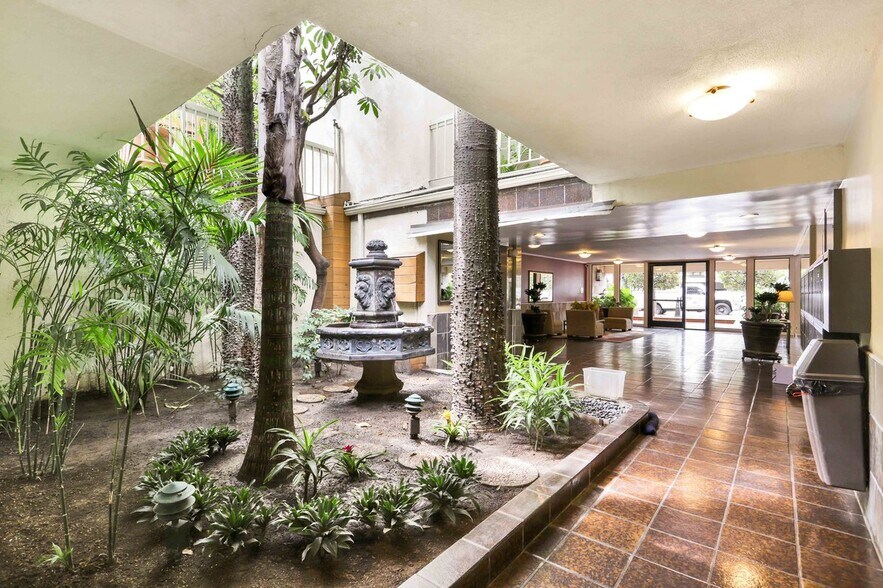 Building Photo - 1230 N Sweetzer Ave