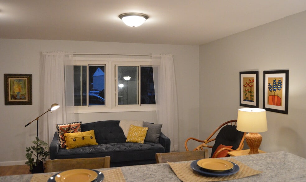 View from kitchen to beautiful living room, enjoy the bar counter for eating, visiting, and more! - 5935 Tangeman Terrace