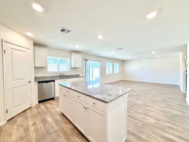 Building Photo - Modern 4 Bedroom 3 Bathroom Living with INCLUDED Solar & Entertainer’s Backyard