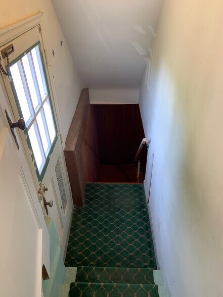 Back door entry from driveway to basement - 2050 New Linden Rd