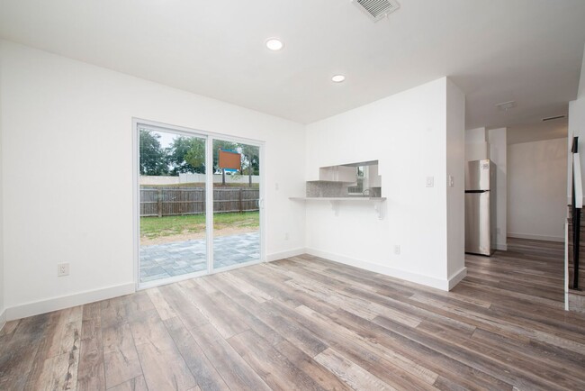 Building Photo - Remodeled and Updated 3/2 House with Garag...