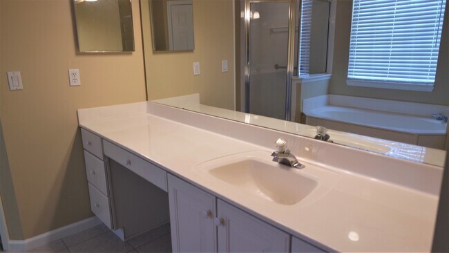 Building Photo - Fall Head Over Heels for this 4 bedroom, 3...