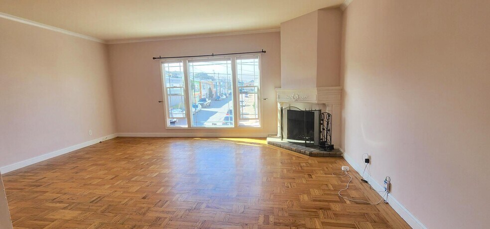 Living Room with ornate Fireplace - 245 Concord St