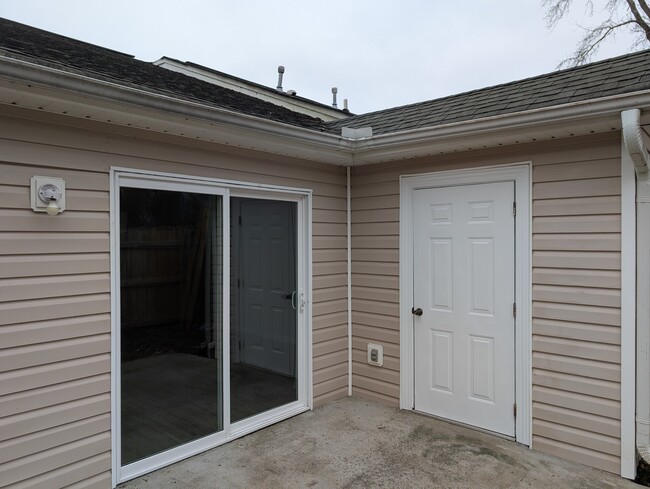 LR Sliding door opens to privacy fenced backyard and Storage Room - 1381 Pinnacle Ln