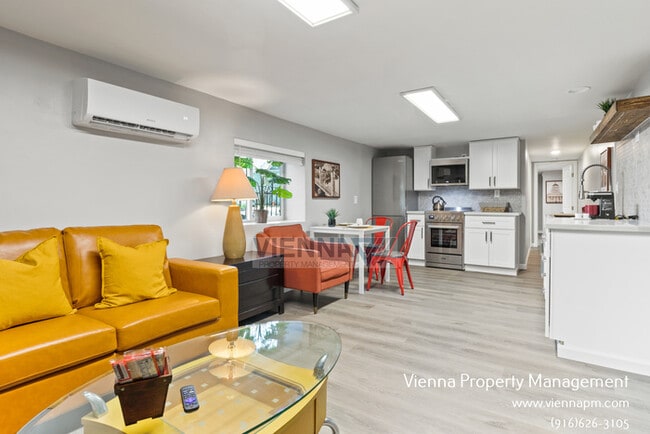 Building Photo - Downstairs Unit Available Now!