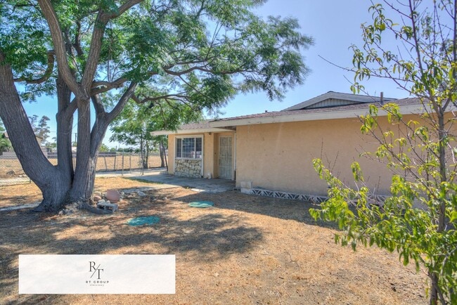 Building Photo - Spacious 4-Bedroom Home on Nearly 1 Acre –...