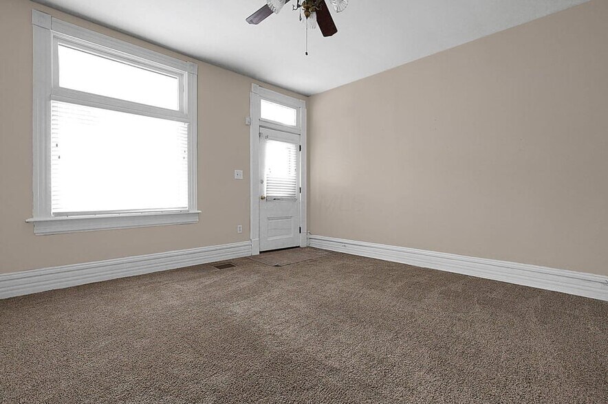 Living room looking at front door - 328 W 1st Ave