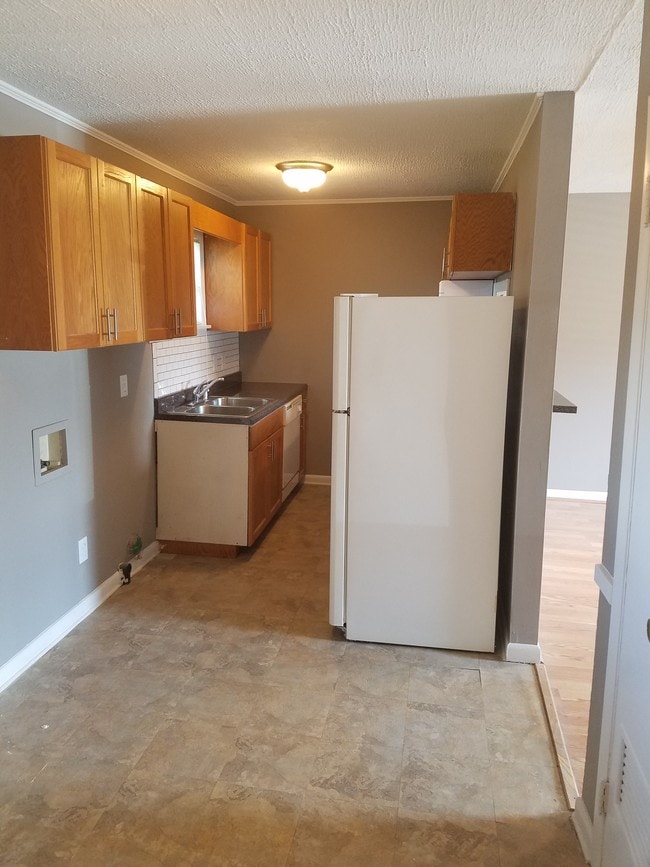 one bedroom kitchen - Frost Garden Apartments