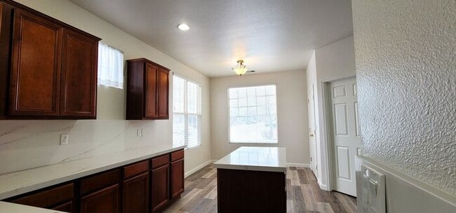 Building Photo - Single-Story 3 Bed, 2 Bath Home in Gated Double Diamond Community – Pool, Gym & 2-Car Garage