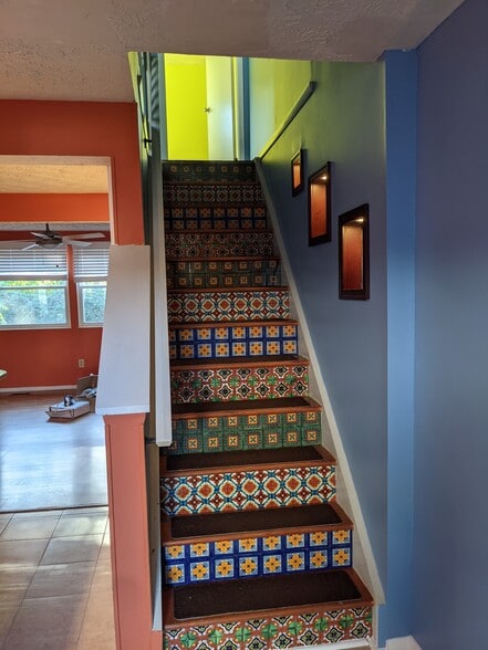 Custom tilework on staircases - 2854 S Meade St