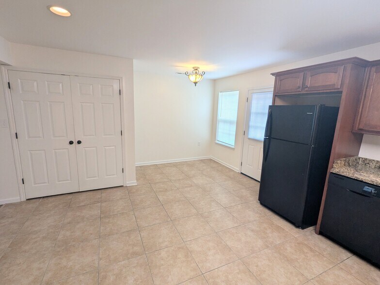 Laundry closet, dining room, back door, kitchen - 2237 Spring Meadow Ln SE