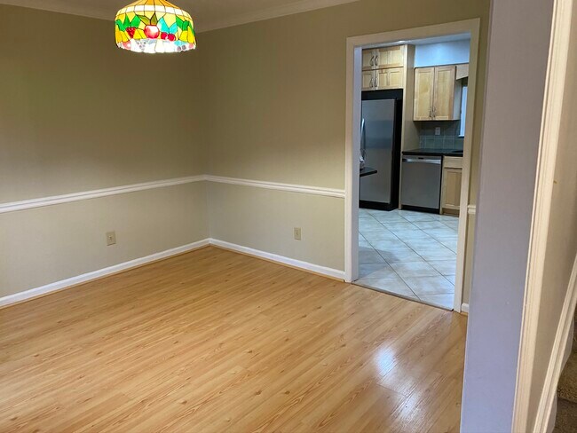 View of the kitchen from the dining room. - 2160 Heritage Trace Ln