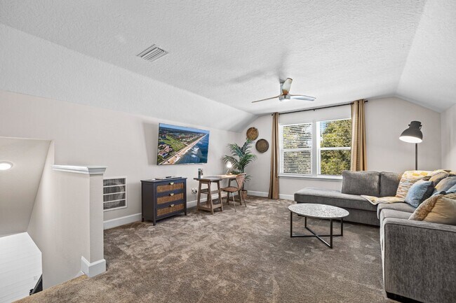Building Photo - "Luxurious Furnished Home with 4-Bed, 3-Bath, Swim Spa Fenced Yard Golf Cart steps to the beach!"