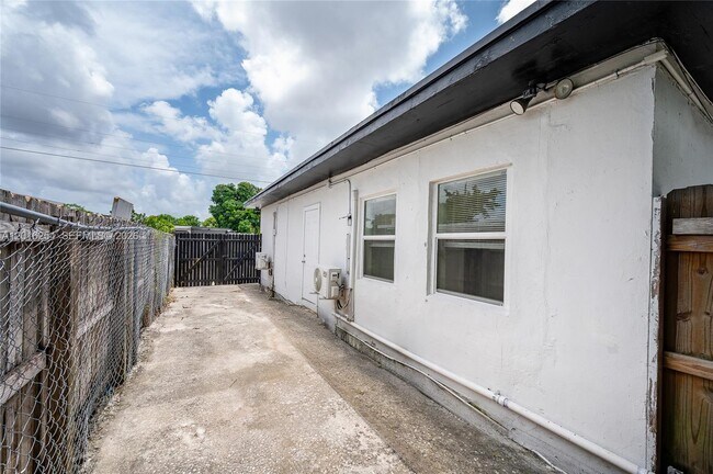 Building Photo - 9050 NW 31st Ave