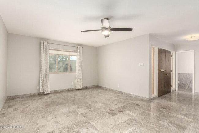 Building Photo - 8212 E Rovey Ave