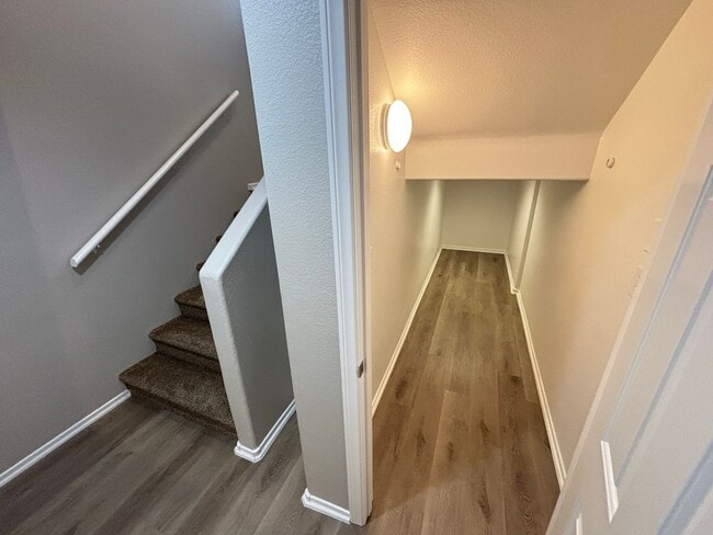 Building Photo - Spacious Tri-Level 4-Bedroom Home with Bal...