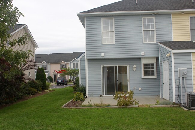 Building Photo - Spacious 3-Bedroom End Unit in Liberty Squ...