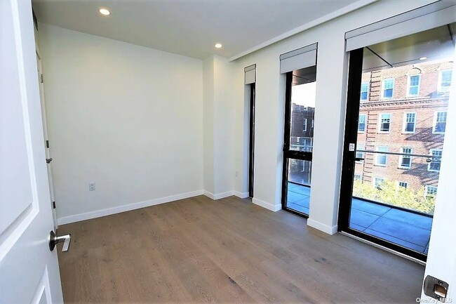 Building Photo - 41-26-41-44 44th St
