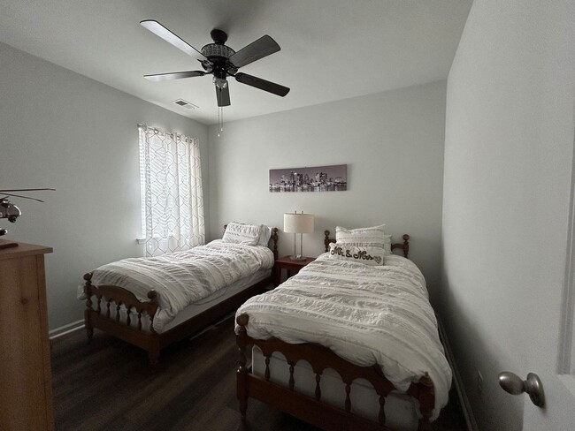 Building Photo - Charming home in Gated Community of Coffee...